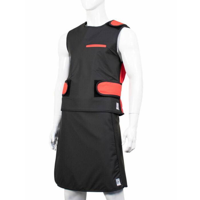 Man Wearing a Vest Fixing His Apron  Free Stock Photo